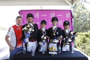 Allyn Mann of Adequan® with the gold medal-winning Region 1 team from the U.S., including Nicholas Hansen, Elizabeth Bortuzzo, Mallory Chambers and Lian Wolfe. (SusanJStickle.com)