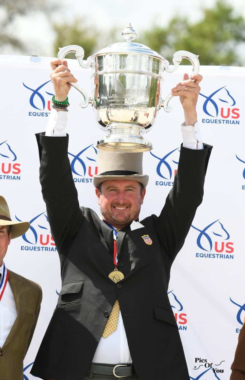 Chester Weber holds the Reginald C. Vanderbilt Cup as winner of the Four-in-Hand Championship ©  Picsofyou.com