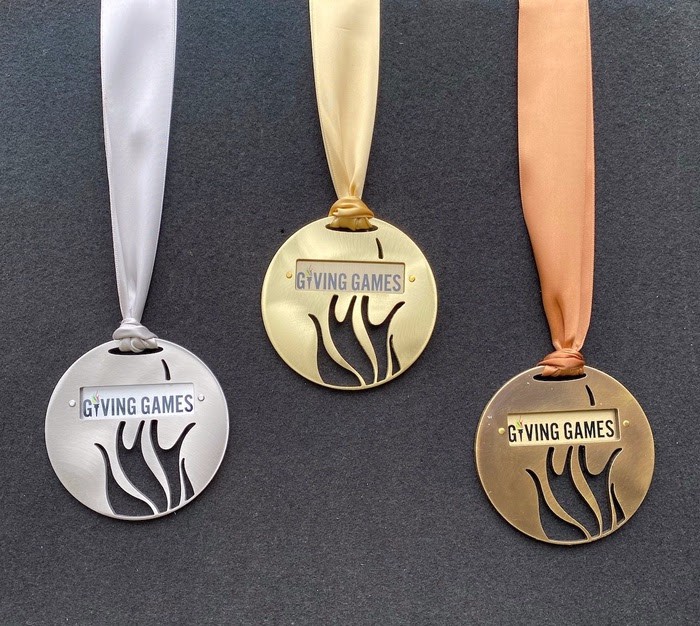 USET Foundation Giving Games Medals