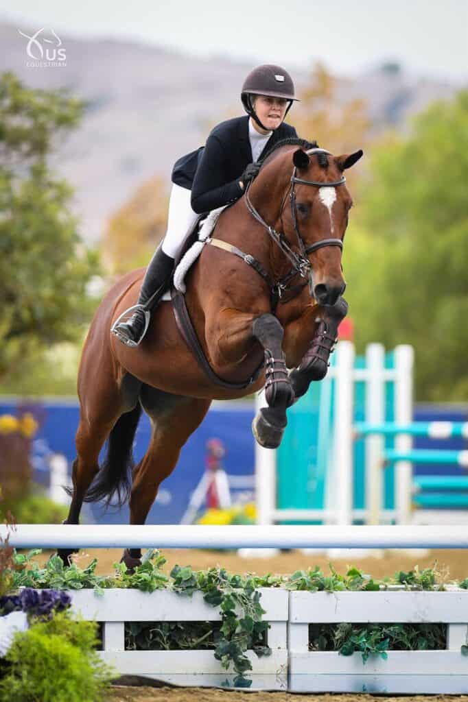 Elisa Broz and Clooney 62 at 2021 Platinum Performance/USEF Show Jumping Talent Search Finals – West