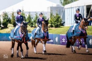 The 2022 NAYC Region 4 Junior Dressage Team at the 2022 FEI North American Youth Championships