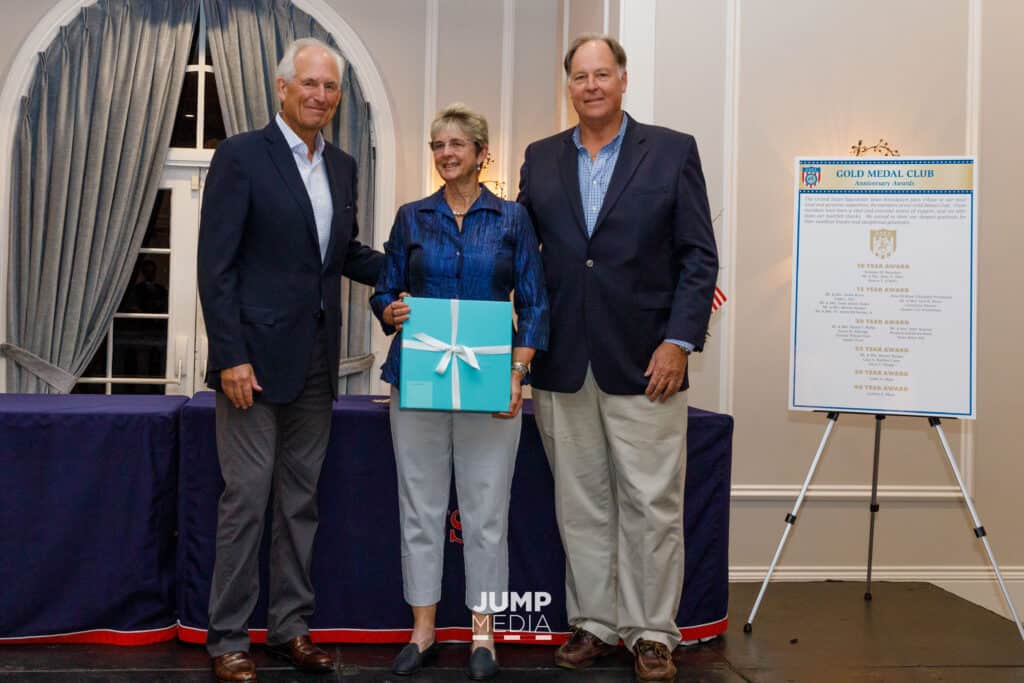 Margaret H. Duprey received the USET Foundation's R. Bruce Duchossois Distinguished Trustee Award from W. James McNerney, Jr. (left), and William H. Weeks (right)