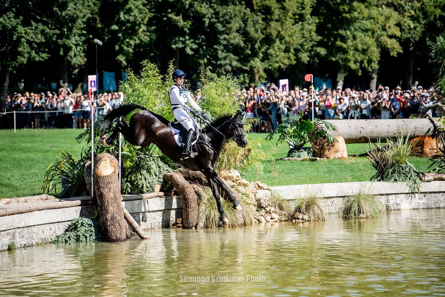 U.S. Eventing Team member Caroline Pamukcu and HSH Blake on the cross country course at the 2024 Paris Olympic Games. Photo by Shannon Brinkman