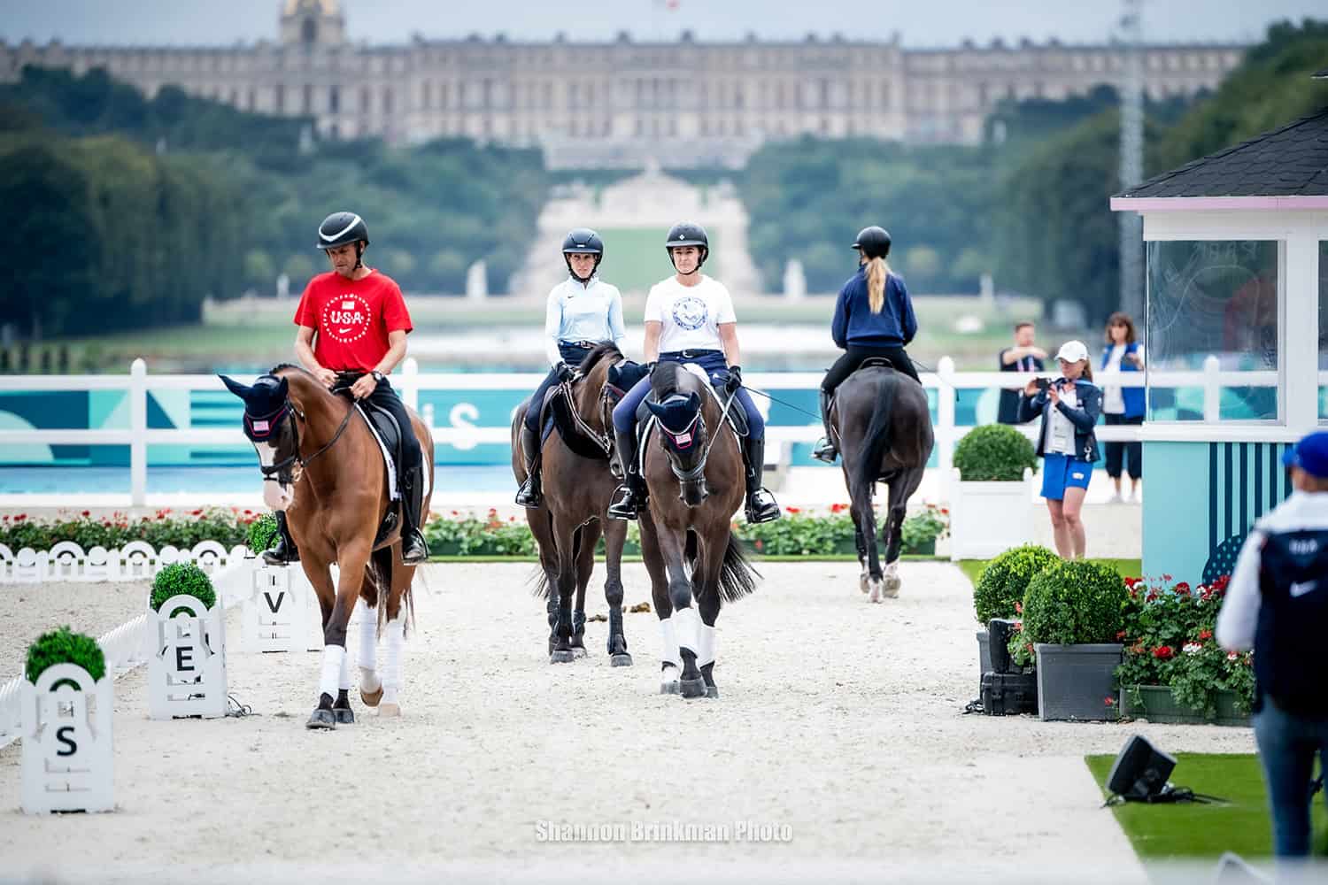 USA Eventing Team practicing in the 2024 Paris Olympic eventing dressage arena. Photo by Shannon Brinkman
