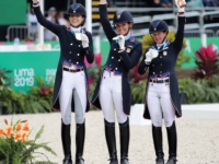 U.S. Dressage Team Silver Medalists Nora Batchelder,
Jennifer Baumert, and Sarah Lockman at the 2019 Pan American Games, Lima, Peru. Photo by Shannon Brinkman U.S. Dressage Team Silver Medalists Nora Batchelder, Jennifer Baumert, and Sarah Lockman at the 2019 Pan American Games, Lima, Peru. Photo by Shannon Brinkman