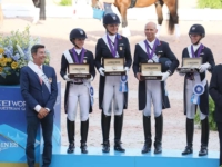 U.S. Dressage Team Silver Medalists Laura Graves,
Adrienne Lyle, Steffen Peters, and Kasey Perry- Glass at the 2018 Tryon World Equestrian Games. Photo by Annan Hepner/Phelps Media Group U.S. Dressage Team Silver Medalists Laura Graves, Adrienne Lyle, Steffen Peters, and Kasey Perry- Glass at the 2018 Tryon World Equestrian Games. Photo by Annan Hepner/Phelps Media Group