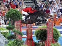 U.S. Jumping Team Gold Medalist Will Simpson and Carlsson vom Dach at the 2008 Beijing Olympic Games. Photo by Susan J. Stickle for Phelps Media Group U.S. Jumping Team Gold Medalist Will Simpson and Carlsson vom Dach at the 2008 Beijing Olympic Games. Photo by Susan J. Stickle for Phelps Media Group
