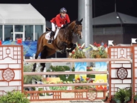 U.S. Jumping Team Gold and Individual Bronze Medalist Beezie Madden and Authentic at the 2008 Beijing Olympic Games. Photo by Susan J. Stickle for Phelps Media Group U.S. Jumping Team Gold and Individual Bronze Medalist Beezie Madden and Authentic at the 2008 Beijing Olympic Games. Photo by Susan J. Stickle for Phelps Media Group