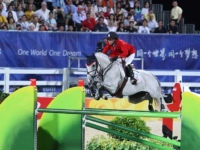 U.S. Jumping Team Gold Medalist Laura Kraut and Cedric at the 2008 Beijing Olympic Games. Photo by Susan J. Stickle for Phelps Media Group U.S. Jumping Team Gold Medalist Laura Kraut and Cedric at the 2008 Beijing Olympic Games. Photo by Susan J. Stickle for Phelps Media Group