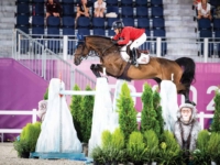 U.S. Jumping Team Silver Medalist Laura Kraut and Baloutinue at the 2020 Tokyo Olympic Games. Photo by Shannon Brinkman U.S. Jumping Team Silver Medalist Laura Kraut and Baloutinue at the 2020 Tokyo Olympic Games. Photo by Shannon Brinkman