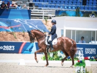 Dressage Team Gold Medalist Sarah Tubman and First Apple at the 2023 Santiago Pan American Games. Photo by Shannon Brinkman Dressage Team Gold Medalist Sarah Tubman and First Apple at the 2023 Santiago Pan American Games. Photo by Shannon Brinkman