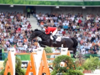 U.S. Jumping Team Bronze and Individual Bronze Medalist Beezie Madden and Cortes C at the 2014 Normandy World Equestrian Games. Photo by Susan J. Stickle U.S. Jumping Team Bronze and Individual Bronze Medalist Beezie Madden and Cortes C at the 2014 Normandy World Equestrian Games. Photo by Susan J. Stickle